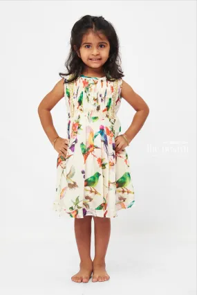 Avian Paradise Sleeveless Dress: Vibrant Bird & Floral Print Frock for Girls